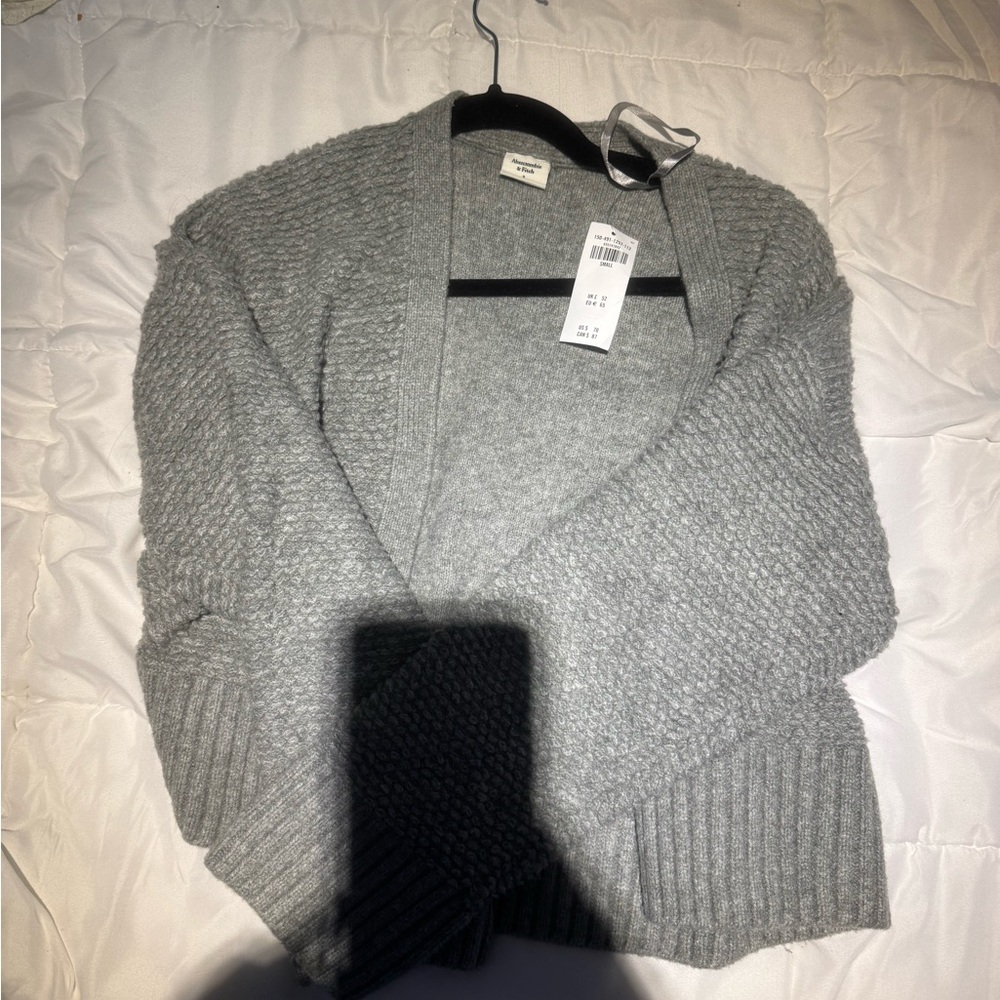 NWT Abercrombie slightly cropped. Hits right at top of pants cardigan sweater